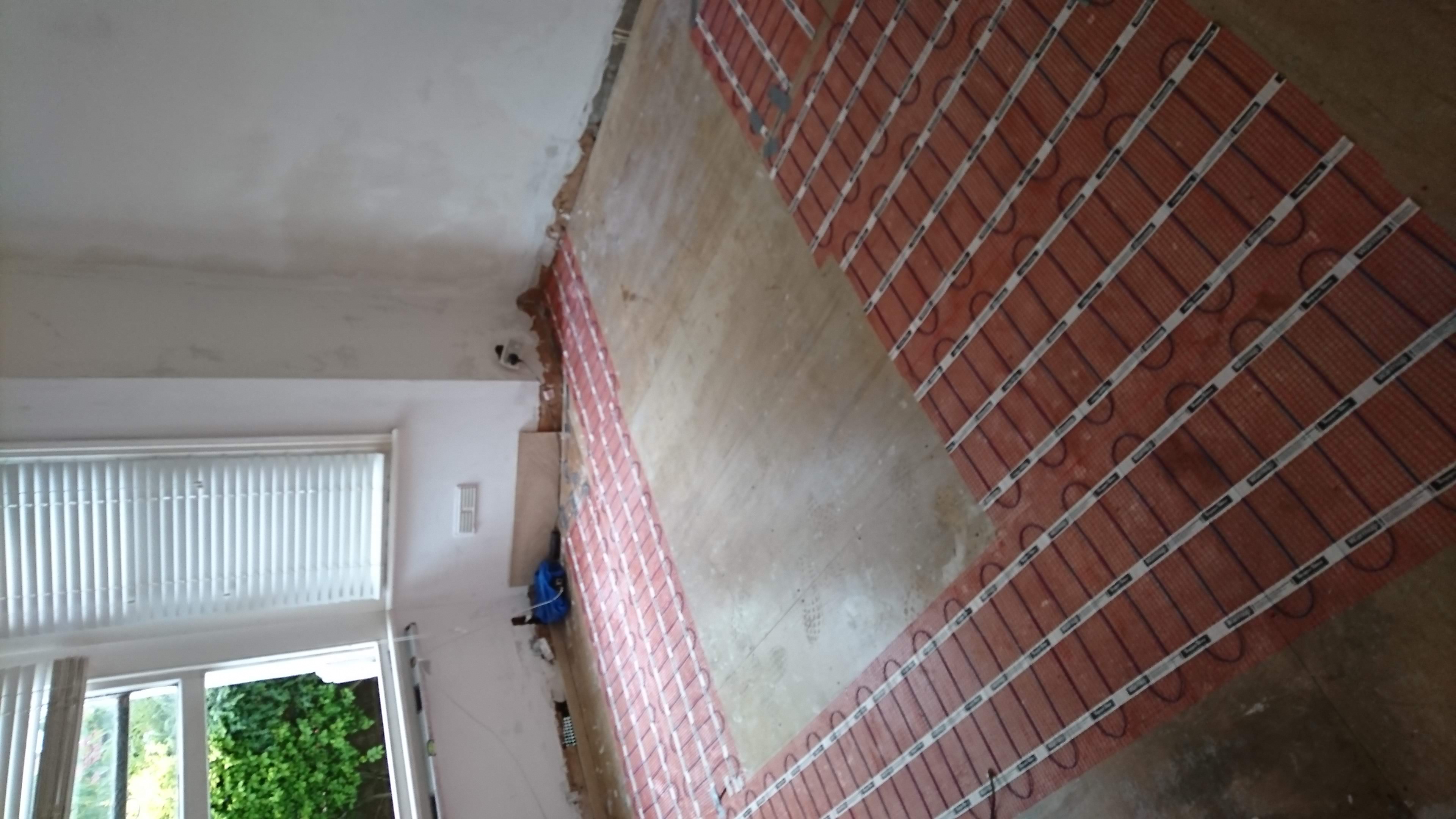bedroom electric under floor heating instalation with tiles before