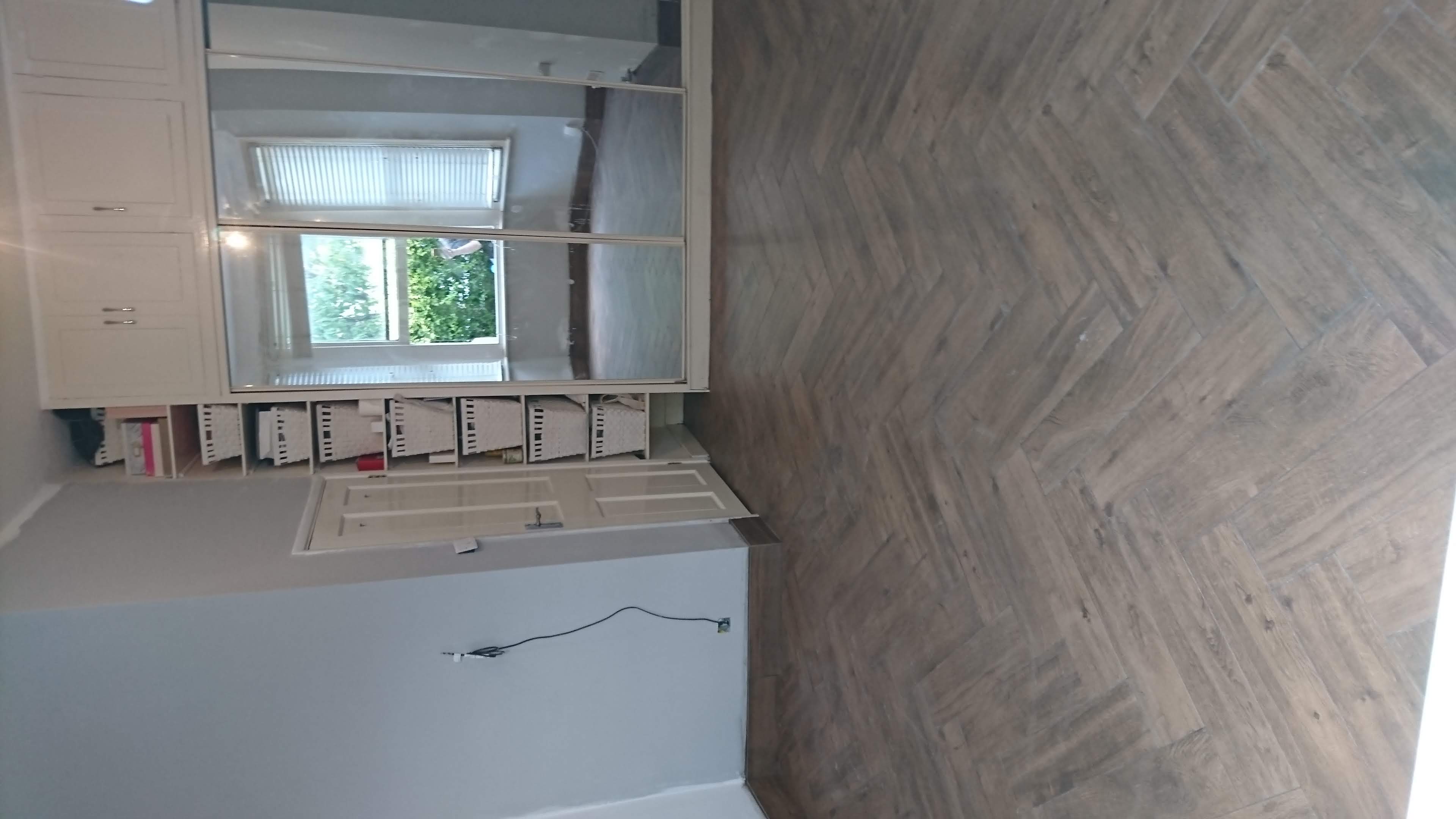 bedroom electric under floor heating instalation with tiles after
