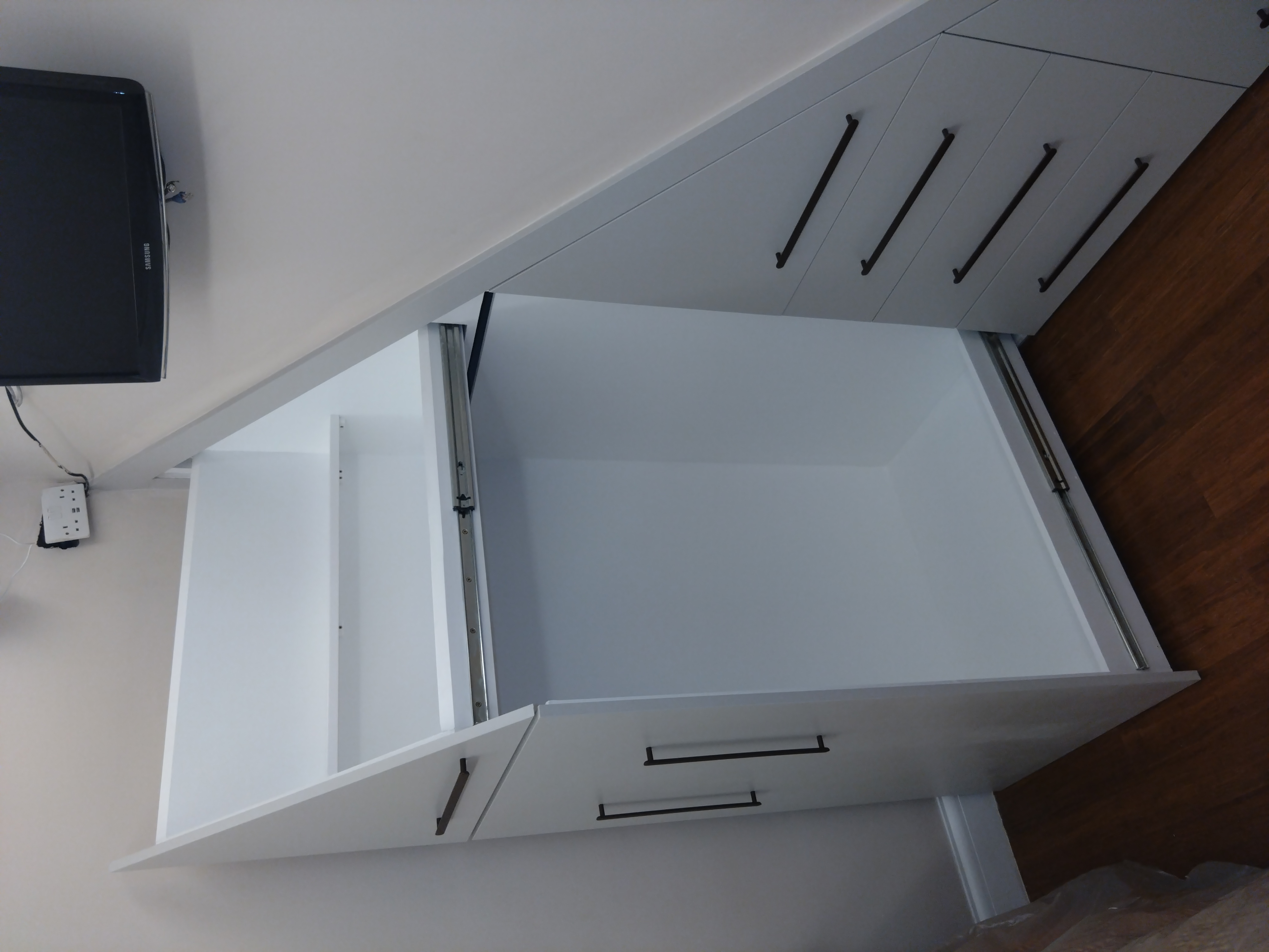 bespoke understairs storage unit with drawers after