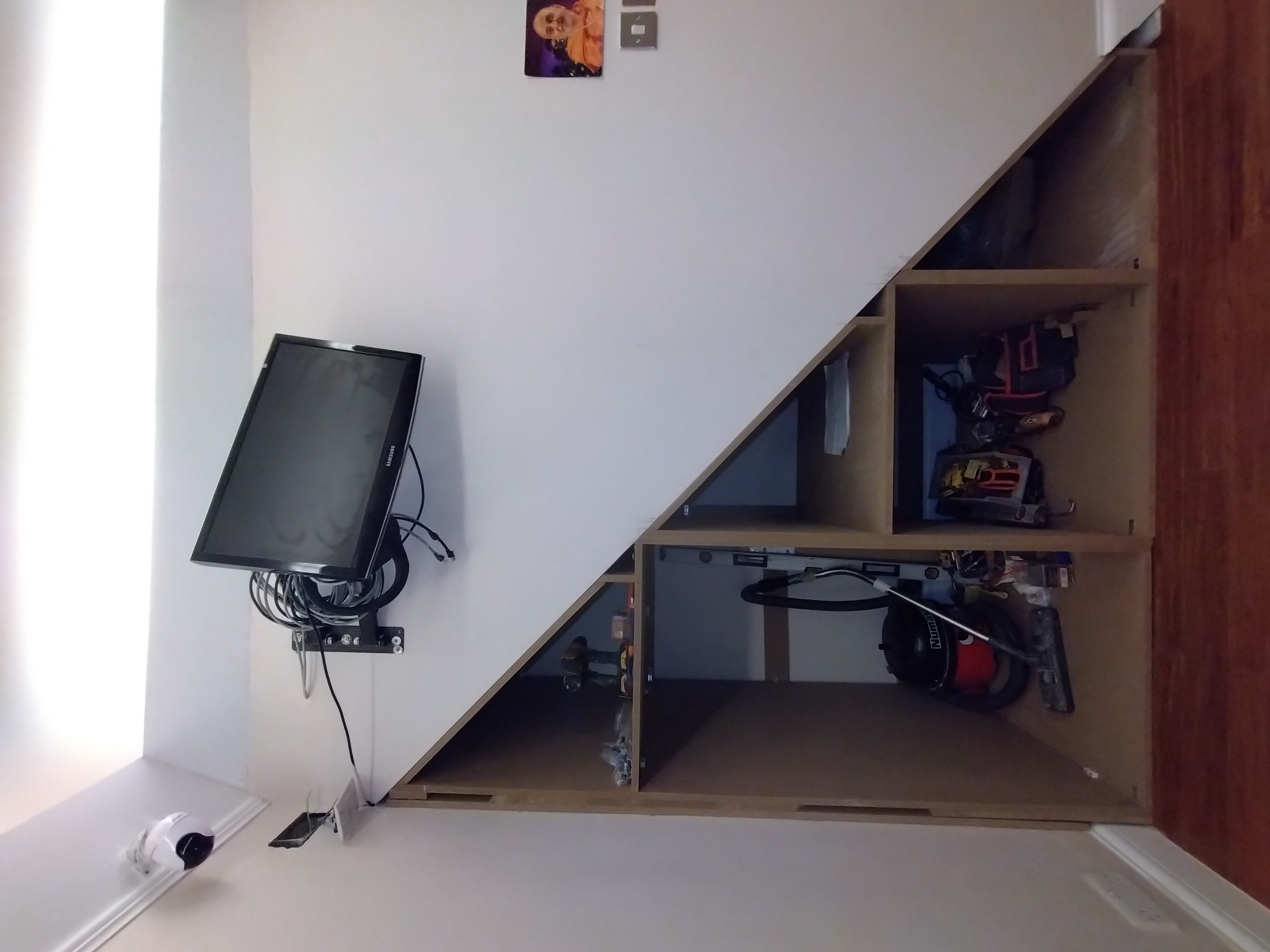 bespoke understairs storage unit with drawers before